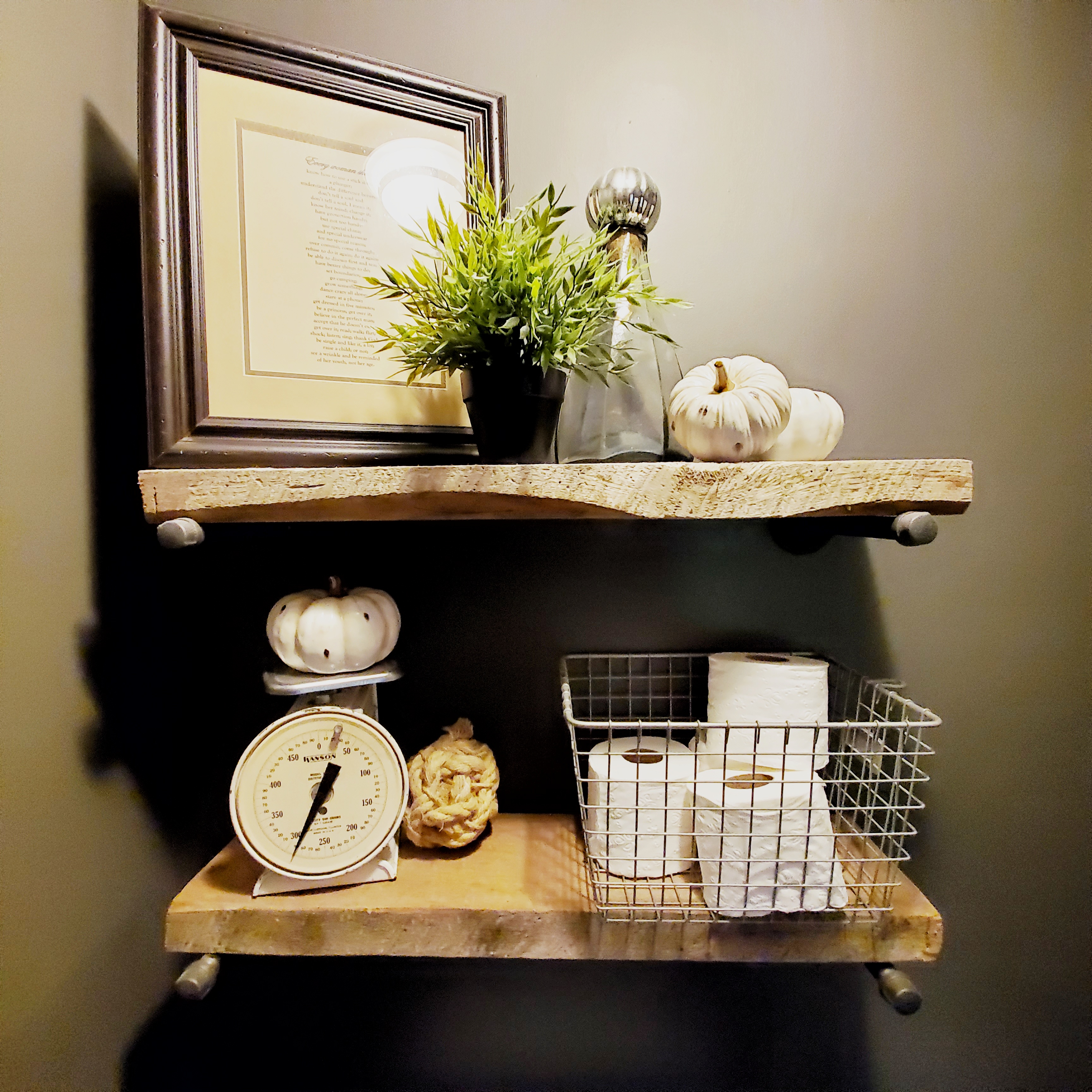 Pipe shelving with reclaimed barnwood shelves.