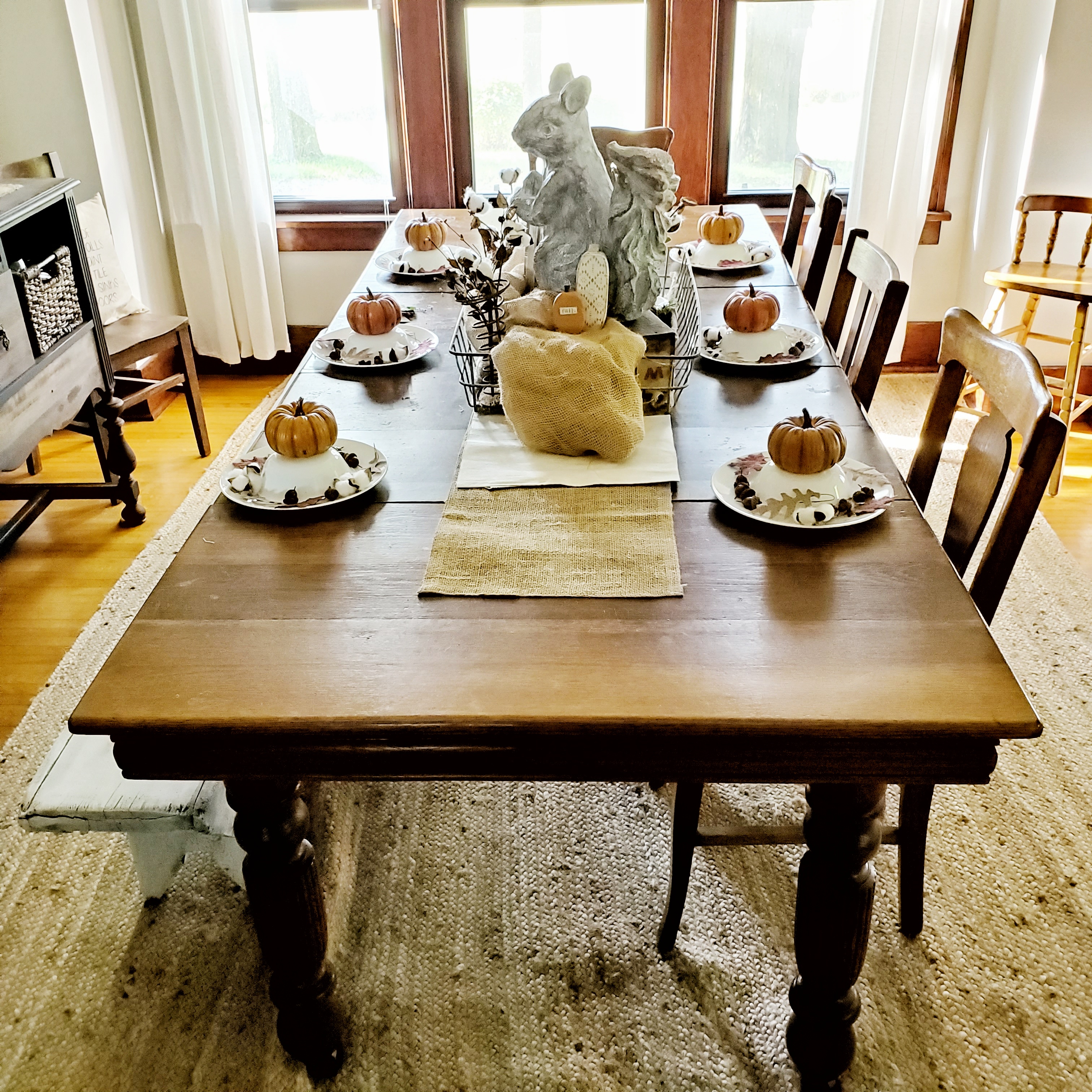 Having a large farmhouse table leaves room for plenty of fall decor and accessories.