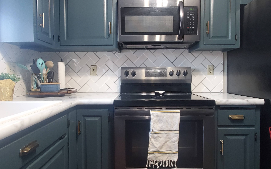 Cabinetry Painting + Herringbone Subway Tile Backsplash | Buffalo Lake, Minnesota