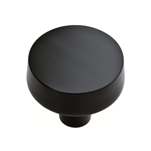 Add a touch of contemporary elegance to your cabinets with the Liberty Soft Modern Matte Black Round Cabinet Knob. This 1-3/8 inch (38 mm) cabinet knob boasts a sleek matte black finish, creating a sophisticated and modern look for your kitchen or bathroom. With its high-quality construction, this cabinet knob is built to withstand everyday use.