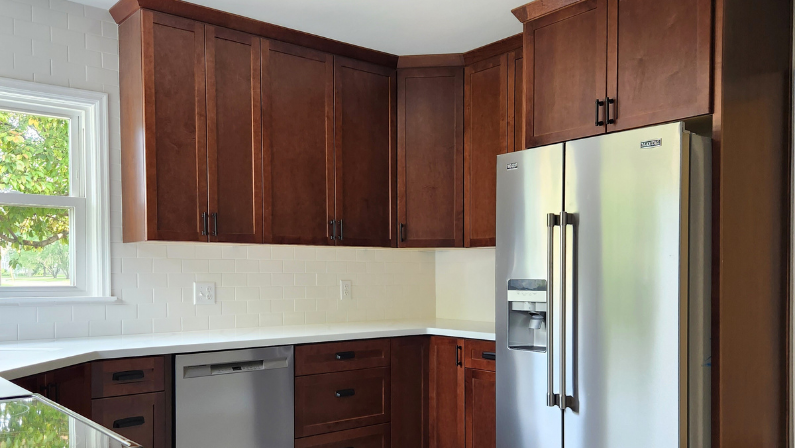 See the before and after of our Stewart Home Flip - this time in the kitchen!