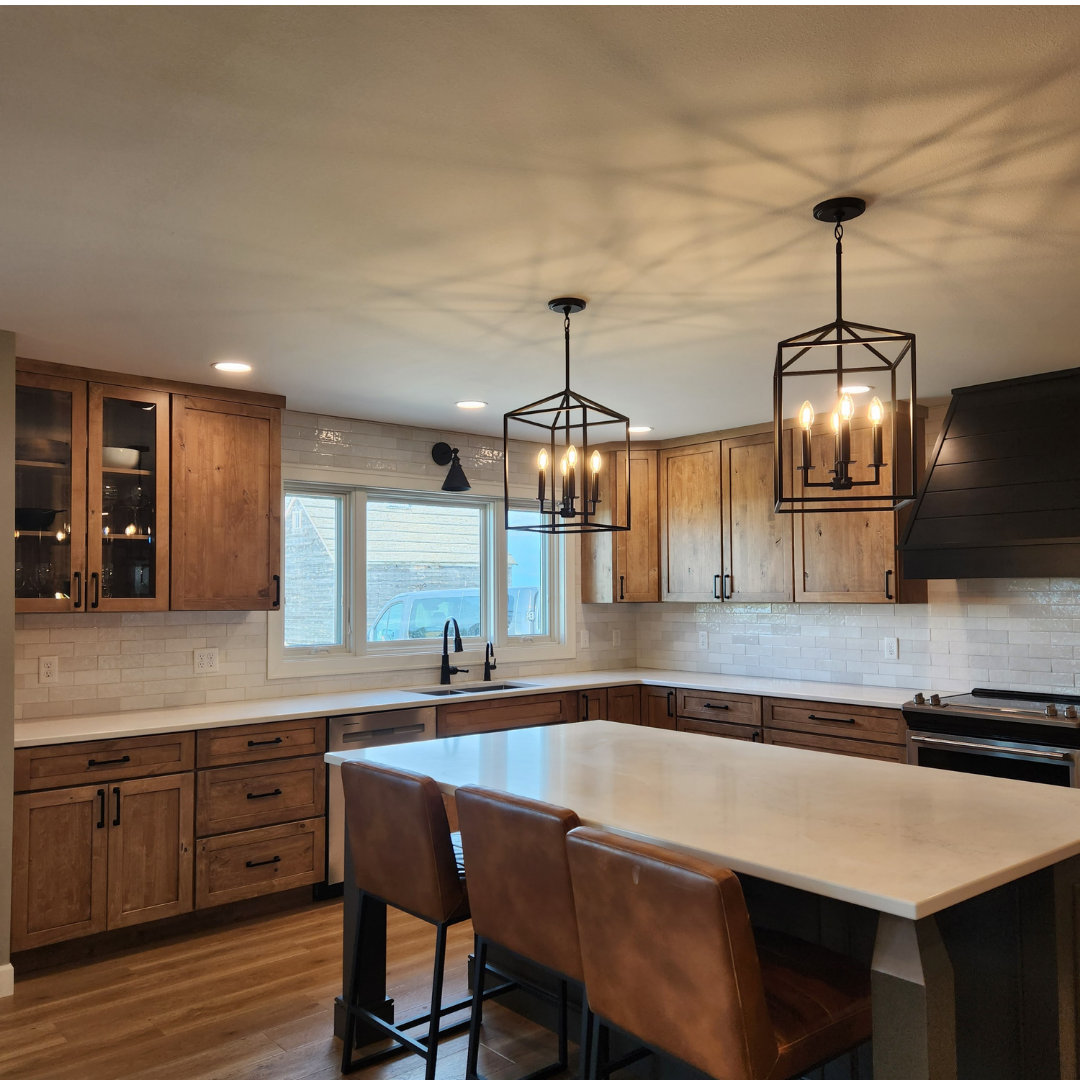 This photo showcases the beauty of adding a backsplash to a kitchen.  It really finishes it off and provides a variety of benefits to the homeowners and the longevity of the kitchen. 