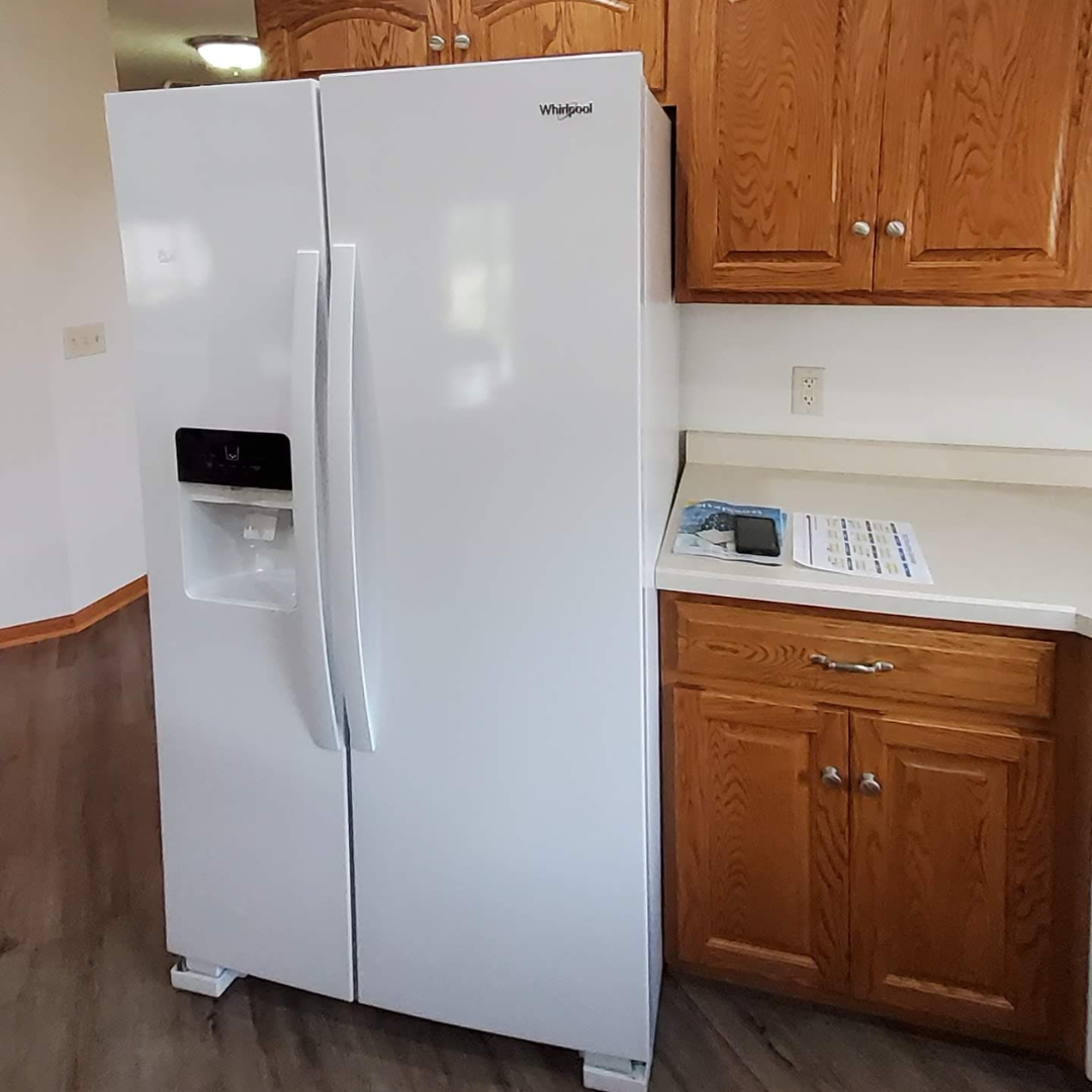 This white fridge combined with the golden oak cabinets was beginning to look tired and a little too dated.  It's time for a refresh! 