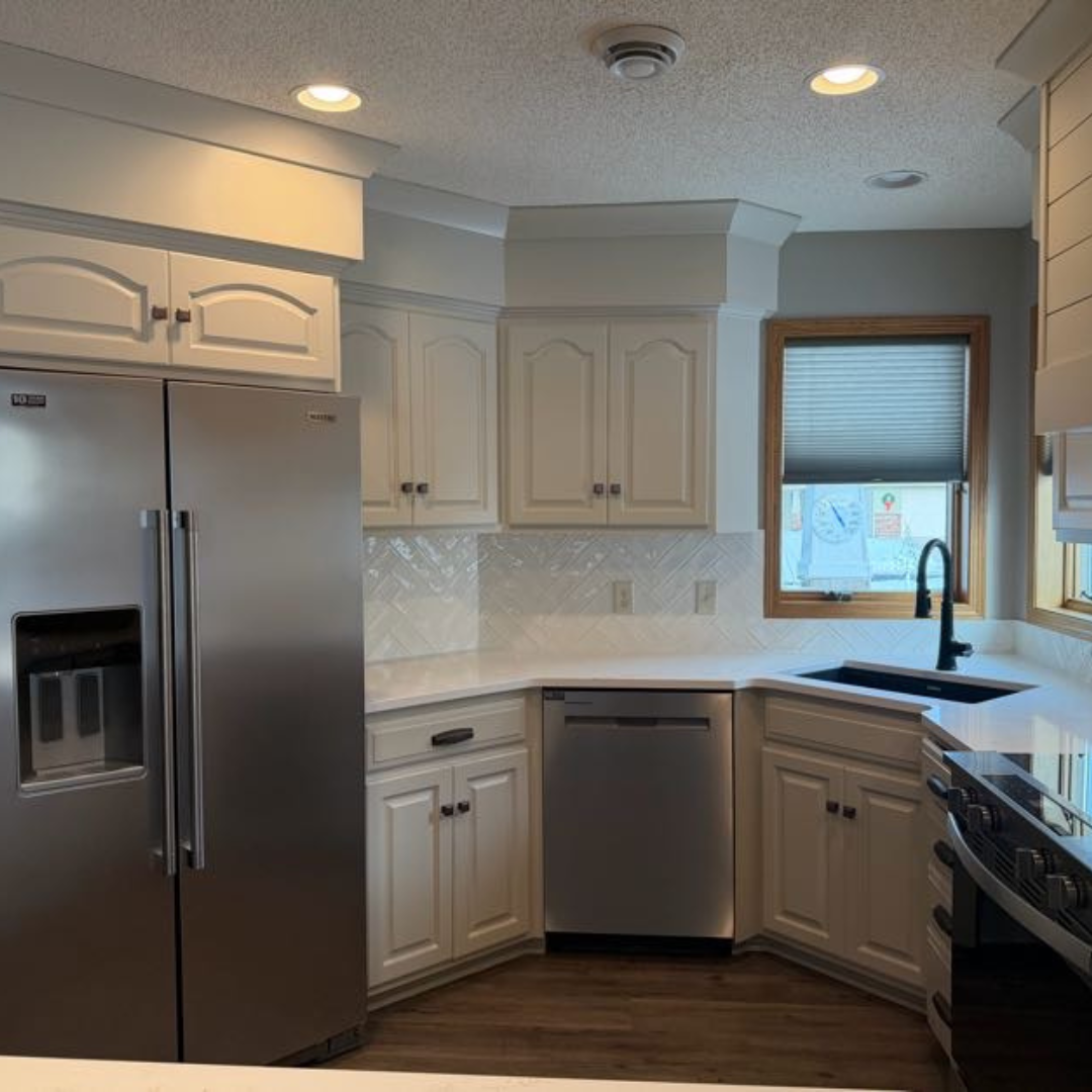 No demo required for this renovation.  This stunning kitchen now has a modern and updated feel.  