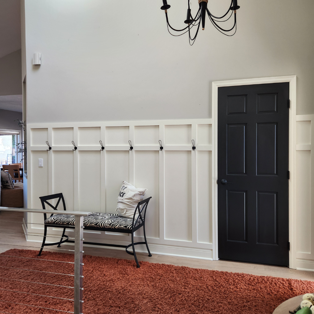 Board and batten is a simple way to add a design element to a room - this looks wonderful in the entry way! 
