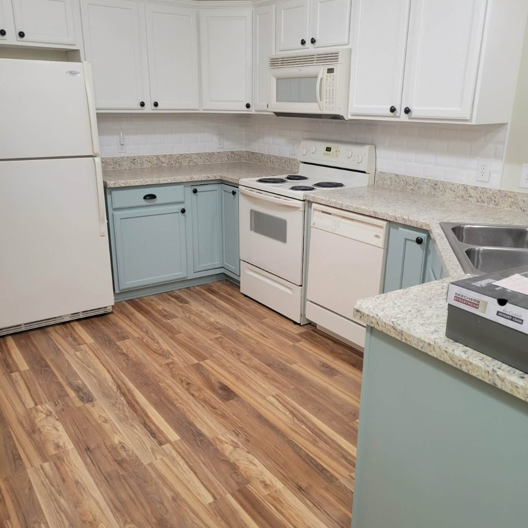 This kitchen is magazine worthy.  Featuring beautiful finishes, some open shelving for visual interest, unique lighting and completely new layout.  