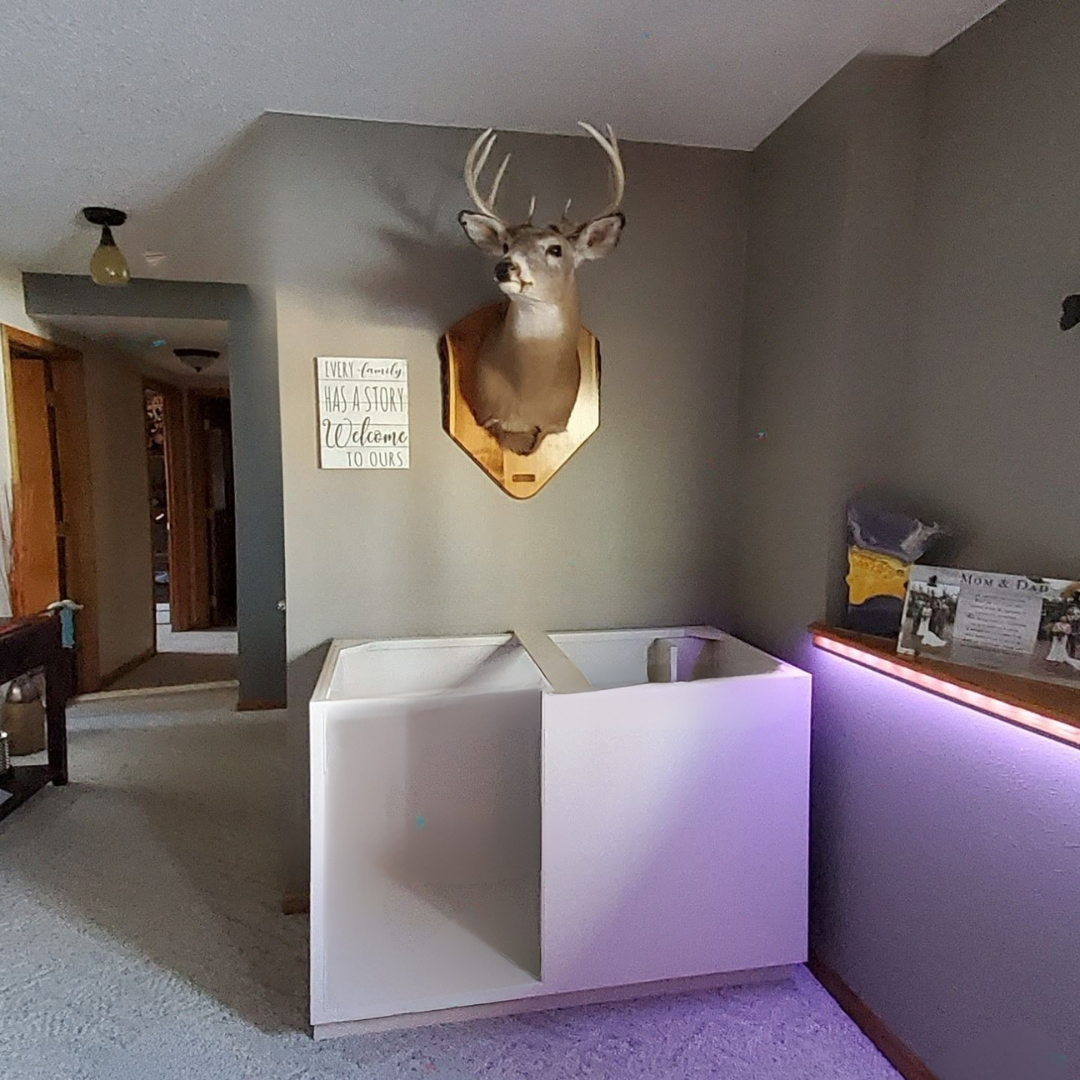 This fireplace is functional but in need of a refresh especially to be cohesive with the rest of the updates happening in the home.  Currently, the surround has more of a mosaic tile look. 