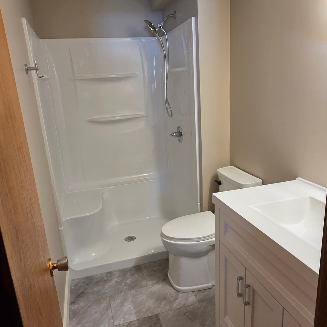 This kitchen is magazine worthy.  Featuring beautiful finishes, some open shelving for visual interest, unique lighting and completely new layout.  