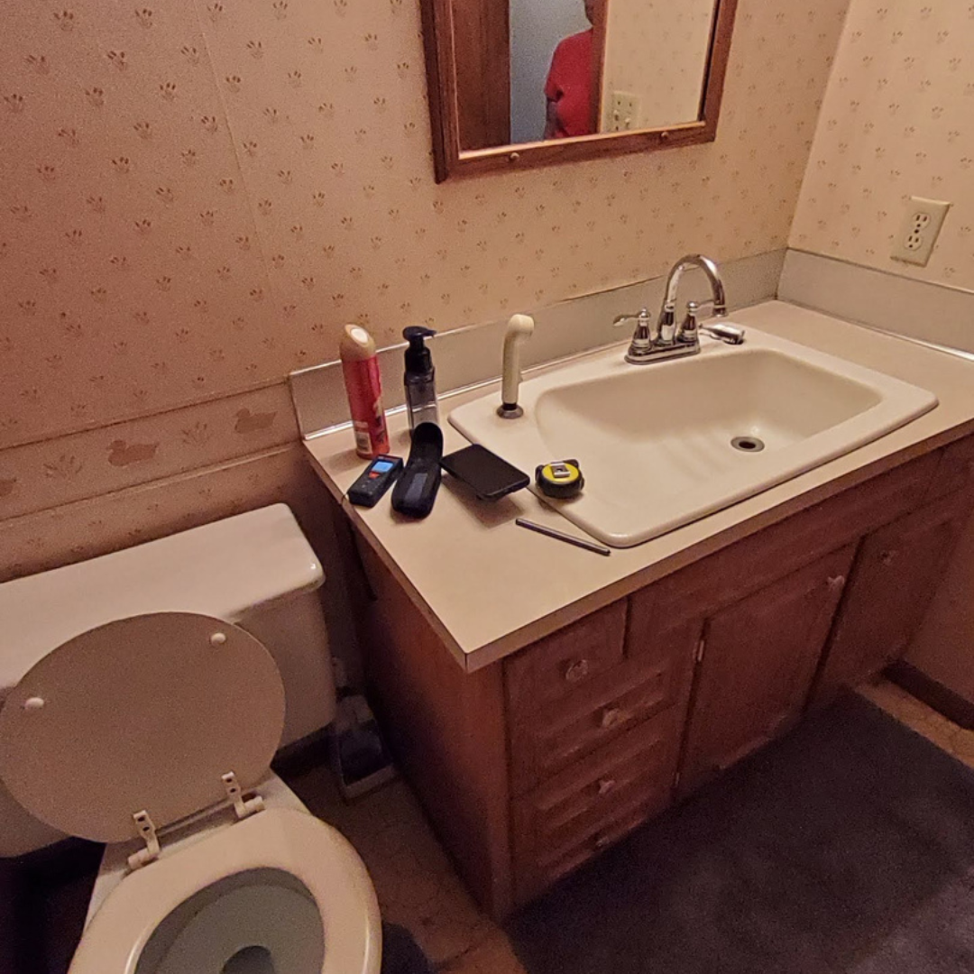 This fireplace is functional but in need of a refresh especially to be cohesive with the rest of the updates happening in the home.  Currently, the surround has more of a mosaic tile look. 