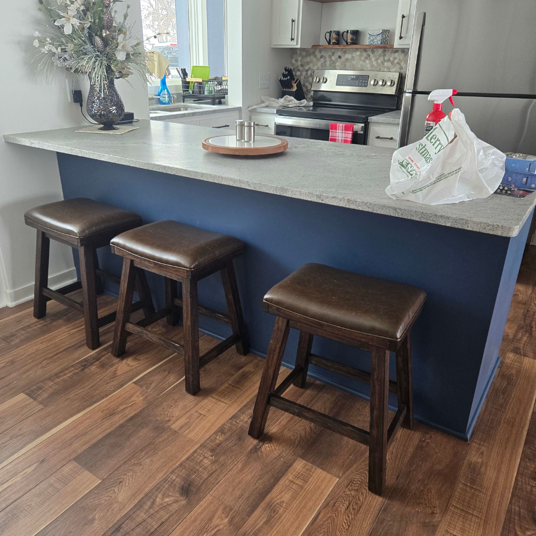 This fireplace is functional but in need of a refresh especially to be cohesive with the rest of the updates happening in the home.  Currently, the surround has more of a mosaic tile look. 