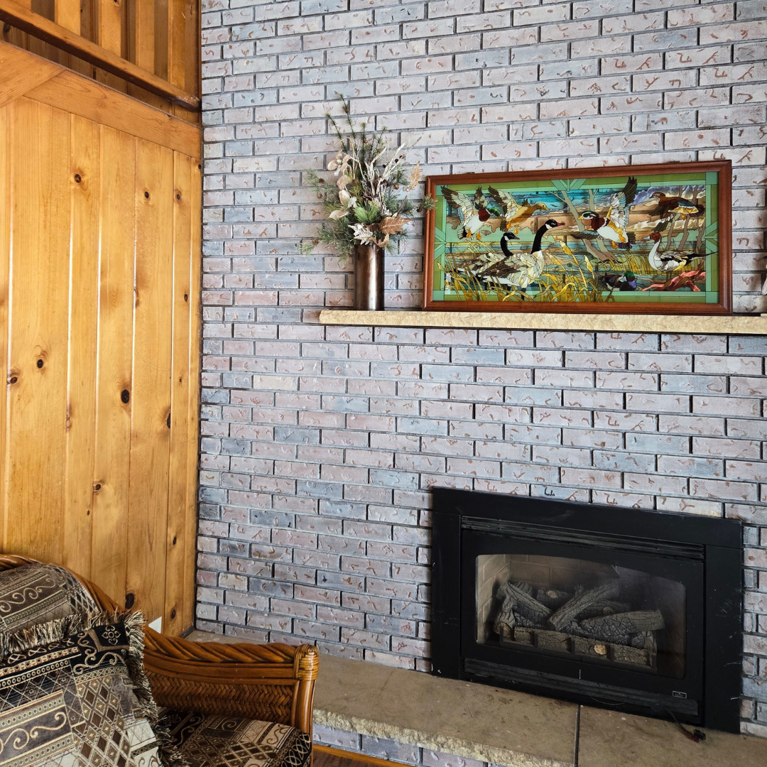 This picture highlights a kitchen ready for a new layout and refresh.  It presents a little dark, and could use brightening.  There is a peninsula that makes an L that could be changed. 