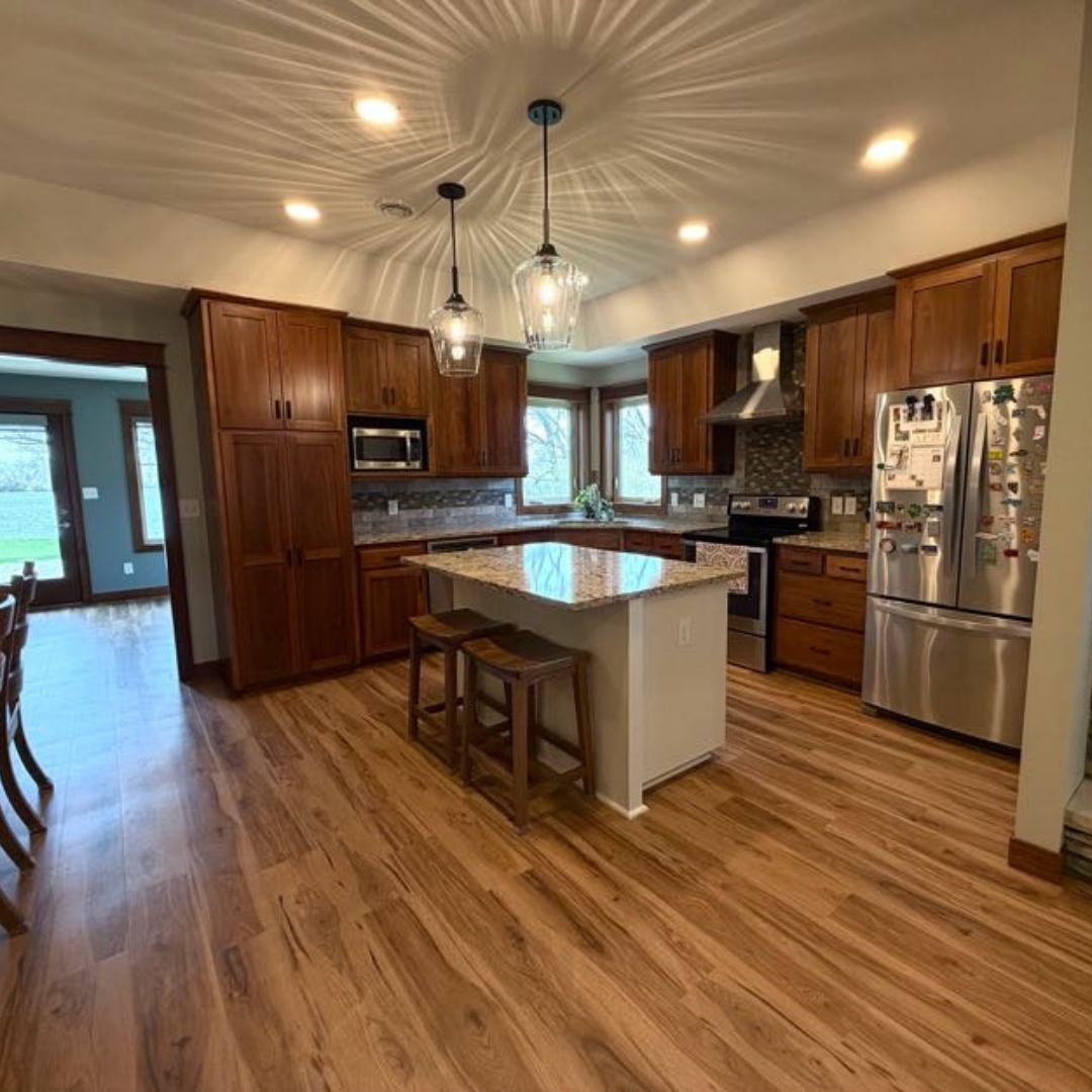 This kitchen is magazine worthy. Featuring beautiful finishes, some open shelving for visual interest, unique lighting and completely new layout. 