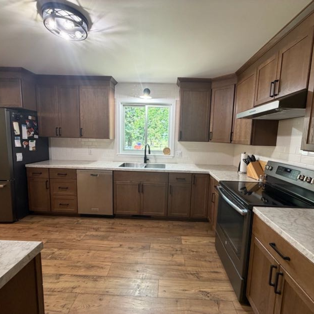 This kitchen is magazine worthy. Featuring beautiful finishes, some open shelving for visual interest, unique lighting and completely new layout. 